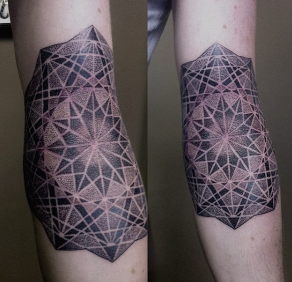 sacred geometry tattoo in black and grey by award winning artist 