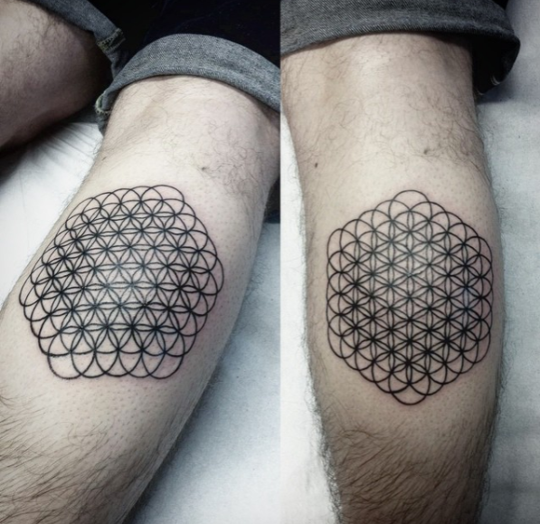 sacred geometry tattoo flower of life, black and grey symmetry pattern, minimalism, calf tattoo, pattern