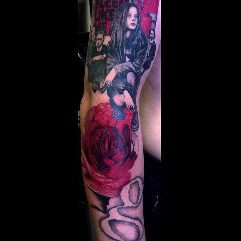Garbage band tattoo red rose, black and grey, pop of colour tattoo, realism portrait sleeve tattoo, band cd cover tattoo