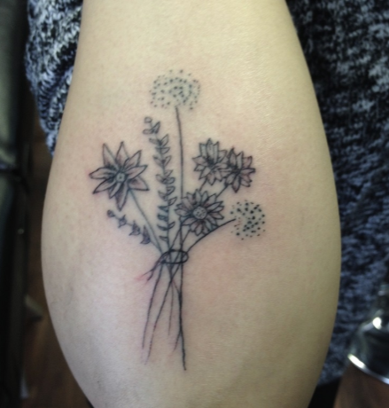 simple cute tattoo flower floral bunch bouquet daisy tattoo, black and grey dotwork flower stem tattoo